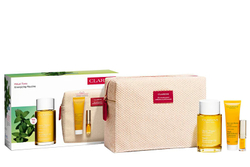Fotoja e Set Vaj për trup 100 ml + Tonik për banjë dhe dush 30 ml + Vaj për buzë 1.4 ml + Çantë kozmetike Clarins Ritual Kit