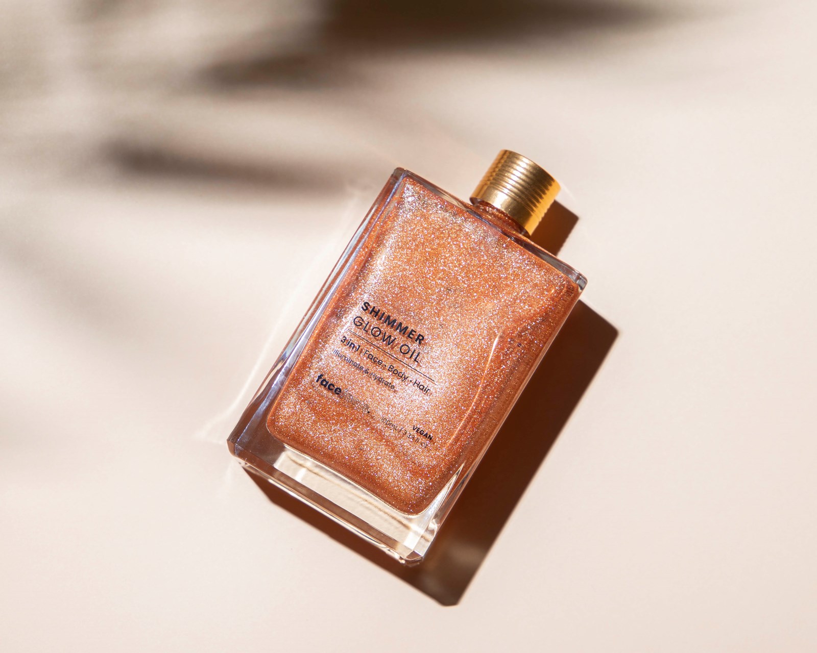 Face Facts 3in1 Shimmer Glow Oil - 100ml - Shkëlqyes-Ndriçues për trup dhe fytyrë