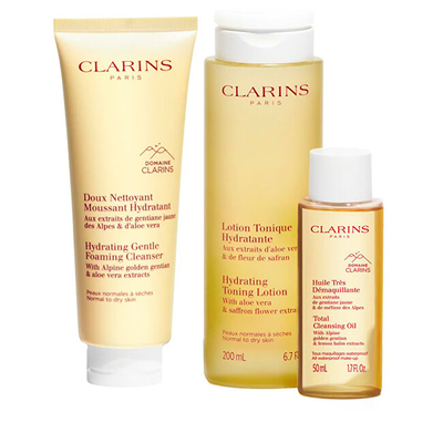 Set Shkumë pastruese 125 ml + Losion tonifikues hidratues 200 ml + Vaj për heqjen e makijazhit 50 ml + Çantë kozmetike Clarins